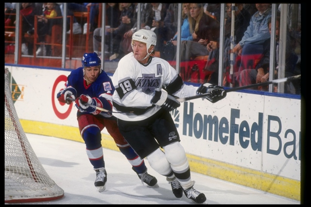 Defenseman Larry Robinson of the Los Angeles Kings works against a Winnipeg Jets player during a game at the Winnipeg Arena in Winnipeg, Manitoba.