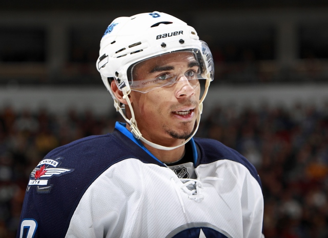 VANCOUVER, BC - DECEMBER 22:  Evander Kane #9 of the Winnipeg Jets looks to the bench during their NHL game against the Vancouver Canucks at Rogers Arena December 22, 2013 in Vancouver, British Columbia, Canada. Vancouver won 2-1. (Photo by Jeff Vinnick/N