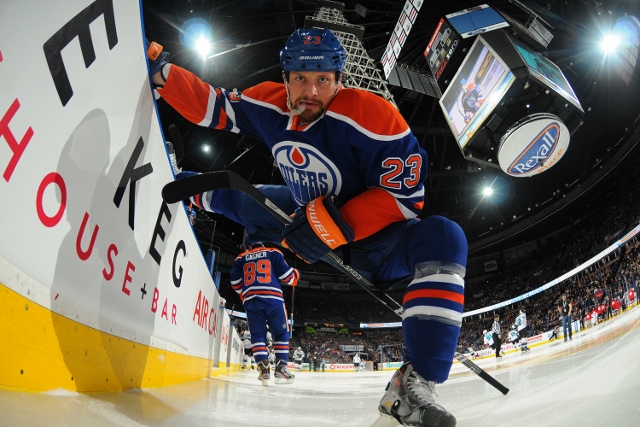 EDMONTON, AB - JANUARY 29: Matt Hendricks #23 of the Edmonton Oilers warms up prior to a game against the San Jose Sharks on January 29, 2014 at Rexall Place in Edmonton, Alberta, Canada. (Photo by Andy Devlin/NHLI via Getty Images)