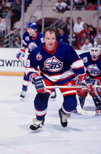 BOSTON, MA. - 1990's: Randy Carlyle #8 of the Winnipeg Jets plays against the Boston Bruins .  (Photo by Steve Babineau/NHLI via Getty Images)