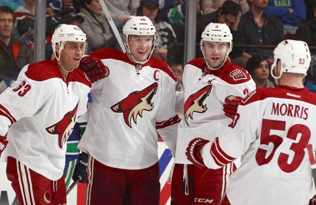 VANCOUVER, BC - JANUARY 26:  Mike Ribeiro #63, Shane Doan #19; Keith Yandle #3 and Derek Morris #53 of the Phoenix Coyotes celebrate a goal against the Vancouver Canucks during their NHL game at Rogers Arena January 26, 2014 in Vancouver, British Columbia