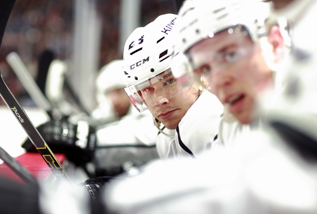 VANCOUVER, BC - APRIL 5:  Dustin Brown #23 of the Los Angeles Kings looks on from the bench during their NHL game against the Vancouver Canucks at Rogers Arena April 5, 2014 in Vancouver, British Columbia, Canada.  Vancouver won 2-1. (Photo by Jeff Vinnic