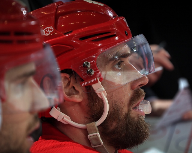 DETROIT, MI - OCTOBER 23: Henrik Zetterberg #40 of the Detroit Red Wings watches the action from the bench against the Pittsburgh Penguins during a NHL game on October 23, 2014 at Joe Louis Arena in Detroit, Michigan. The Wings defeated the Penguins 3-2 i