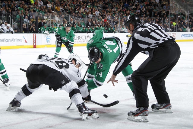 DALLAS, TX - DECEMBER 31:  Jamie Benn #14 of the Dallas Stars tries to win a faceoff against Jarret Stoll #28 of the Los Angeles Kings at the American Airlines Center on December 31, 2013 in Dallas, Texas. (Photo by Glenn James/NHLI via Getty Images)