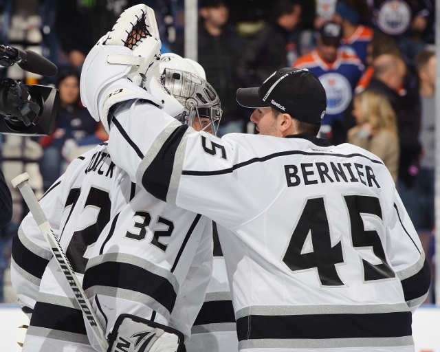 EDMONTON, CANADA - FEBRUARY 19: Jonathan Bernier #45 and Jonathan Quick #32 of the Los Angeles Kings celebrate after defeating the Edmonton Oilers during an NHL game at Rexall Place on February 19, 2013 in Edmonton, Alberta, Canada. (Photo by Derek Leung/