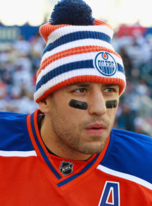 WINNIPEG, MB - OCTOBER 23:  Milan Lucic #27 of the Edmonton Oilers waits to play against the Winnipeg Jets in the 2016 Tim Hortons NHL Heritage Classic at Investors Group Field on October 23, 2016 in Winnipeg, Canada.  (Photo by Jeff Vinnick/NHLI via Getty Images)