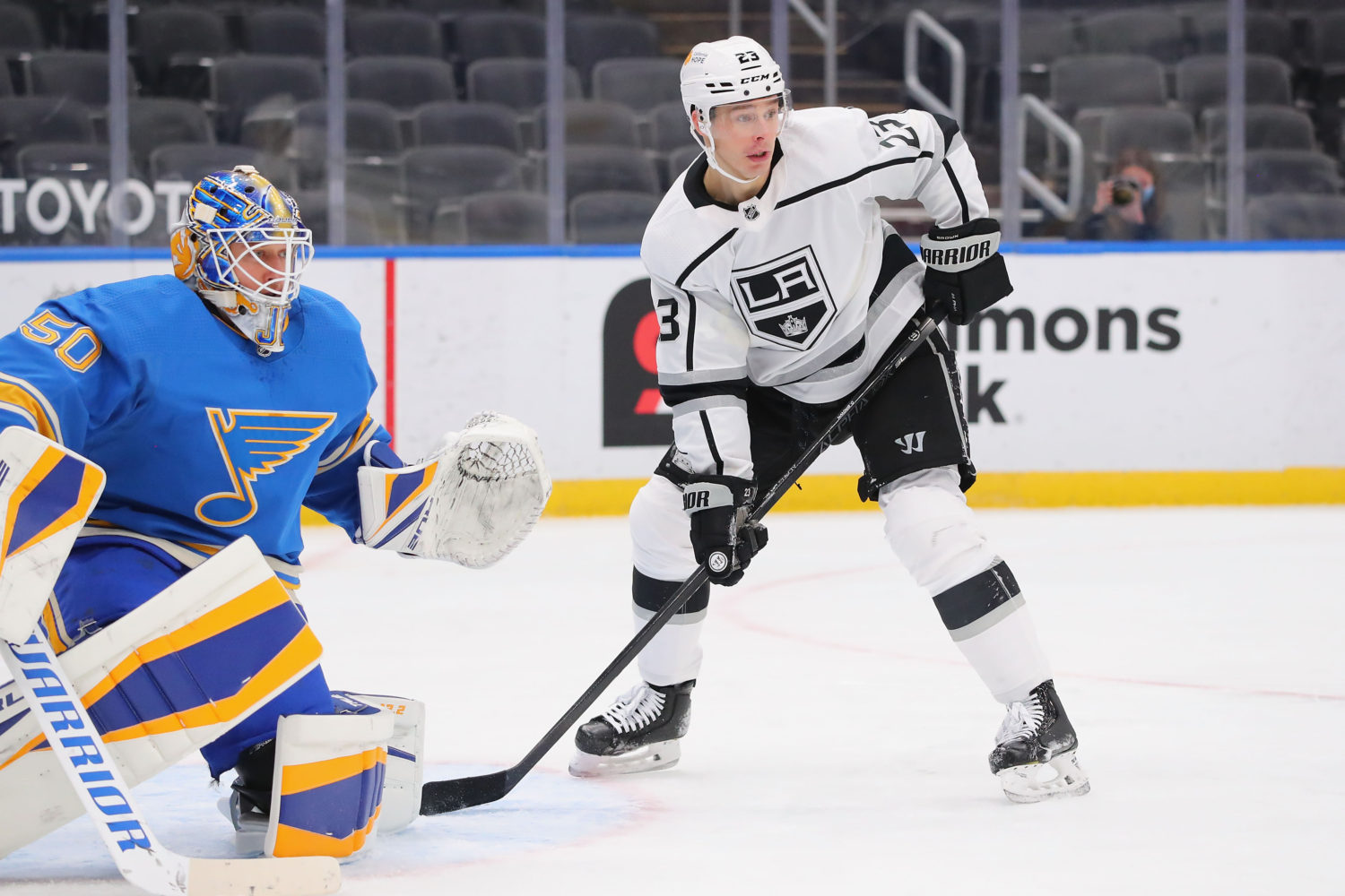 Drew Doughty & Anze Kopitar wearing old school purple & gold Kings