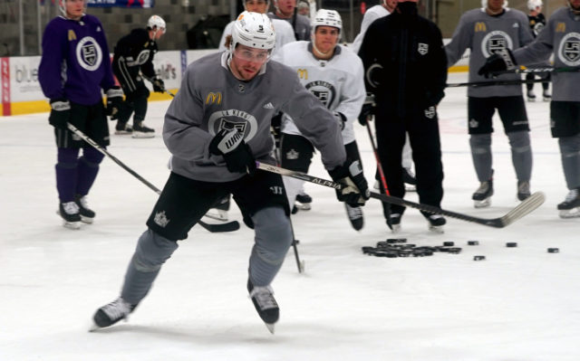 Drew Doughty & Anze Kopitar wearing old school purple & gold Kings